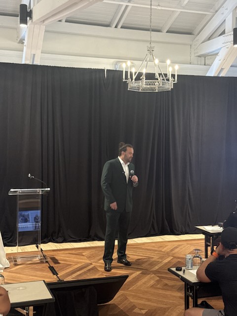 A speaker on stage