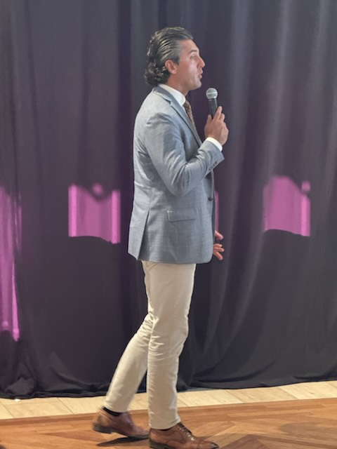 A speaker addressing the audience