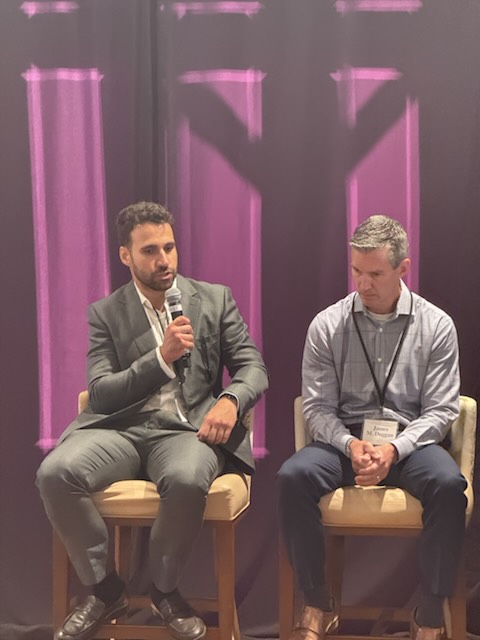 Two panelists during a panel discussion
