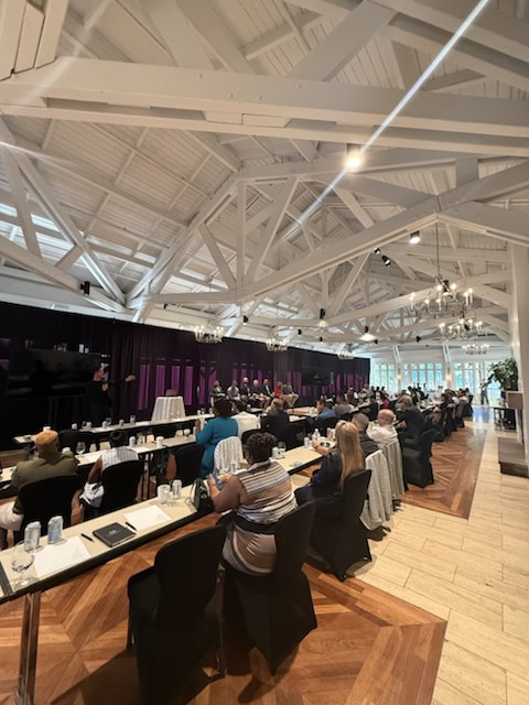 Attendees in the conference room